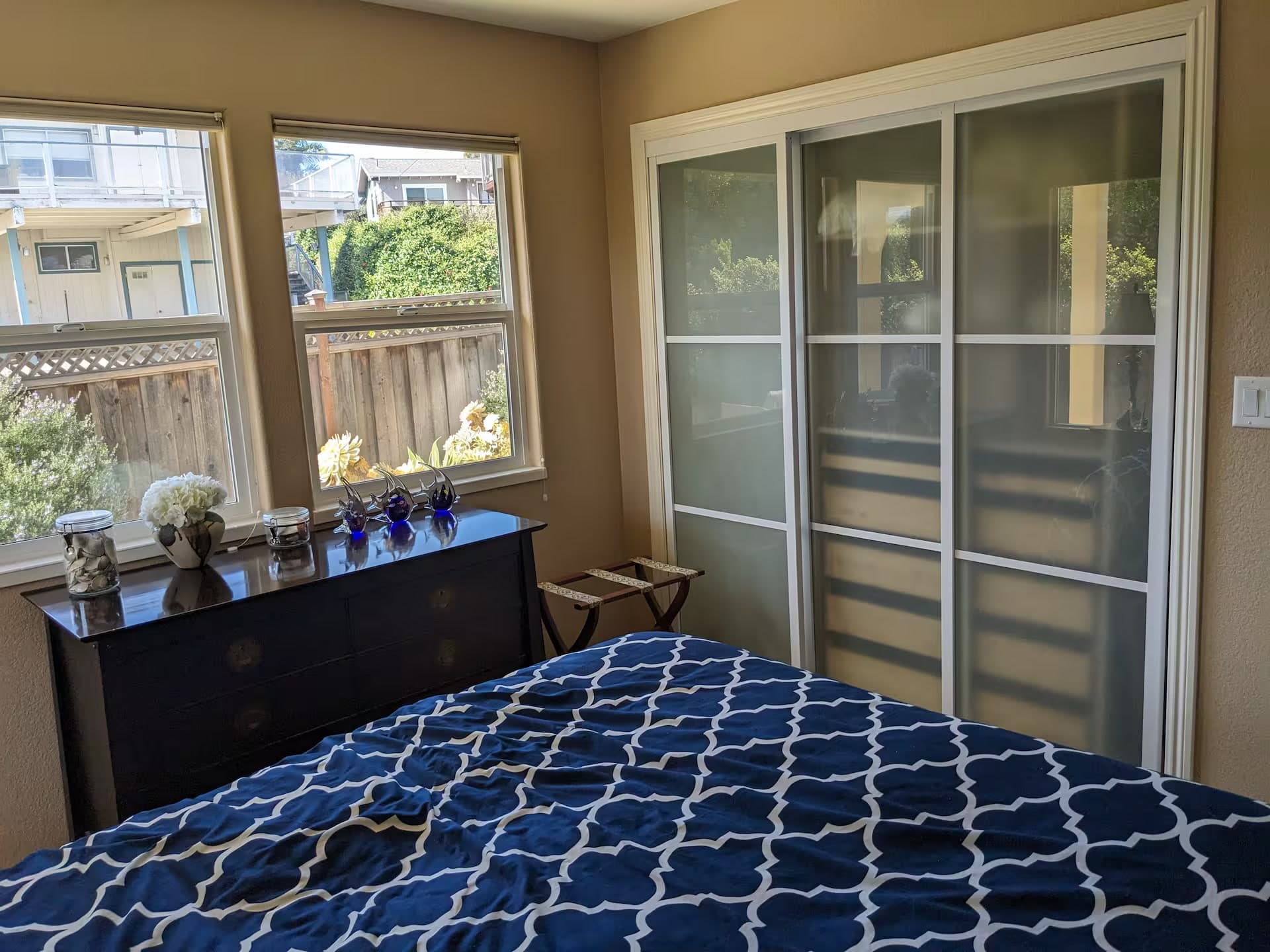 Queen bedroom with coastal furnishings